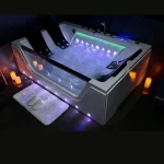 Vasca da bagno per 4 persone da 180x120 cm 50 idrogetti con cascata intagliata Led doppia pompa e bluetooth VA164