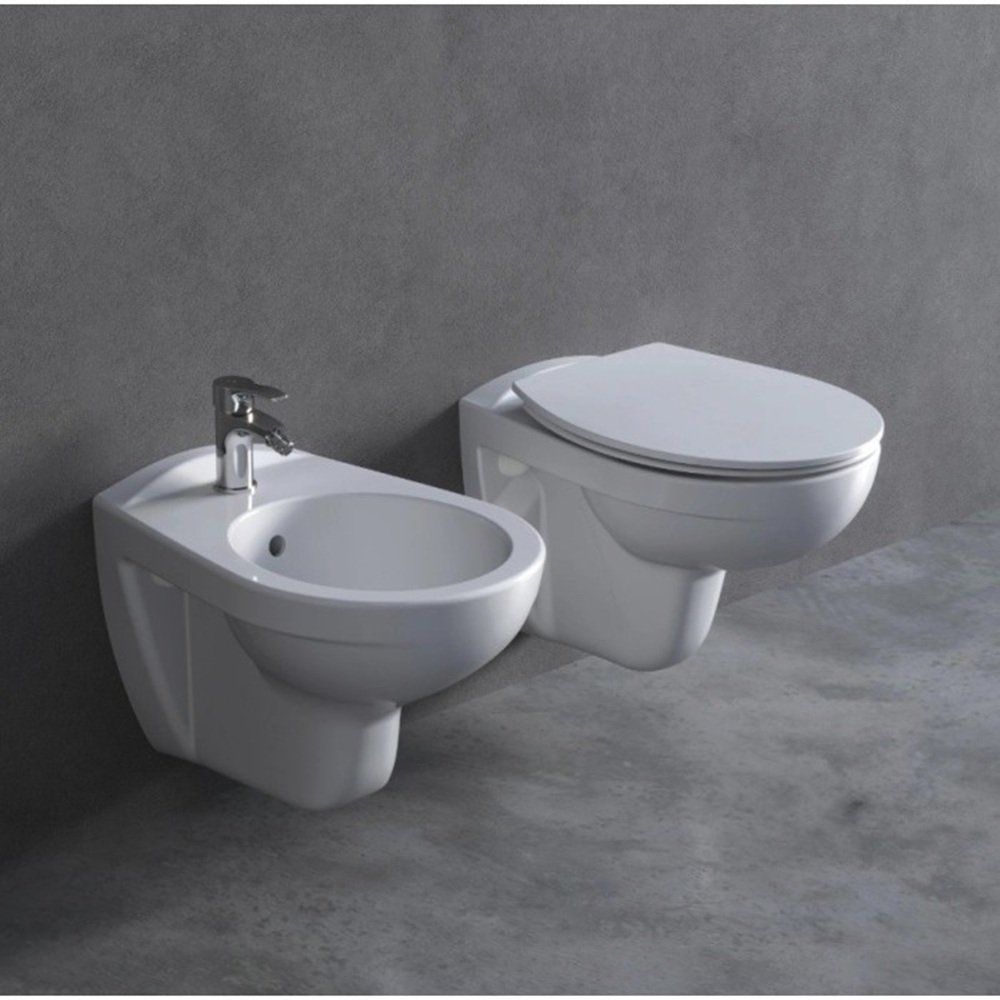 1 Glossy white ceramic wall-hung toilet and bidet Ideal Standard model