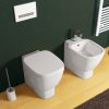 Wc e bidet in ceramica a terra filomuro con copriwc modello Franciacorta